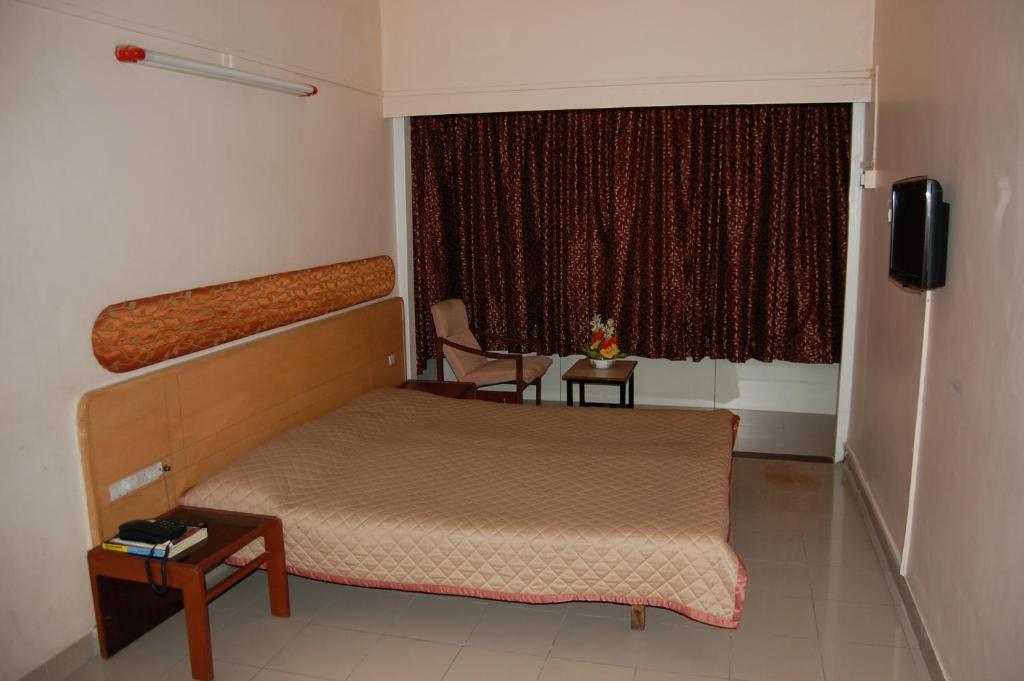 Hotel Raviraj Pune Quarto foto